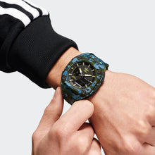 Laden Sie das Bild in den Galerie-Viewer, Adidas Unisex Uhr CITY TECH ONE GRFX Kunststoff grün AOST24075